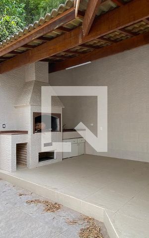 Casa de condomínio à venda com 414m², 4 quartos e 3 vagasChurrasqueira