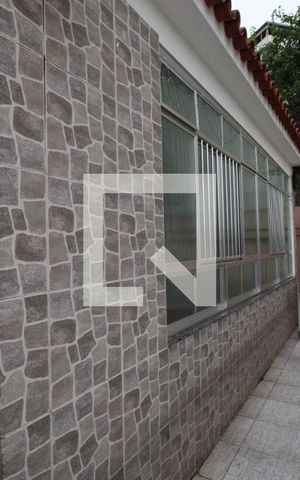 Casa à venda com 455m², 3 quartos e 2 vagasFachada lateral