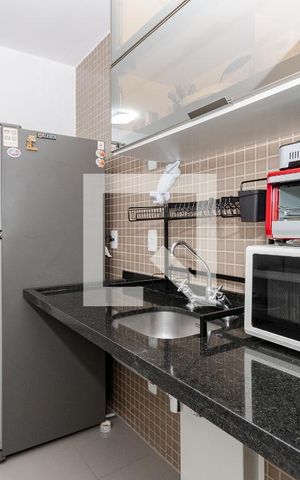 Studio à venda com 33m², 1 quarto e 1 vaga Studio à venda com 33m², 1 quarto e 1 vagaCozinha