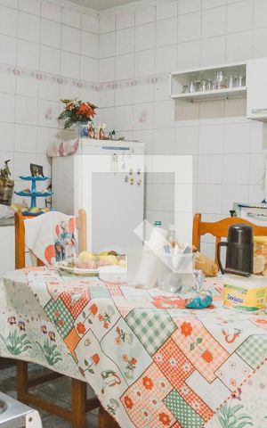 Casa à venda com 112m², 3 quartos e 2 vagas Casa à venda com 112m², 3 quartos e 2 vagasCozinha