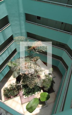 Apartamento à venda com 77m², 2 quartos e 1 vagaPrisma do prédio visto do corredor do apartamento
