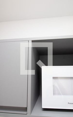 Studio à venda com 21m², 1 quarto e sem vaga Studio à venda com 21m², 1 quarto e sem vagaCozinha, armário superior, microondas