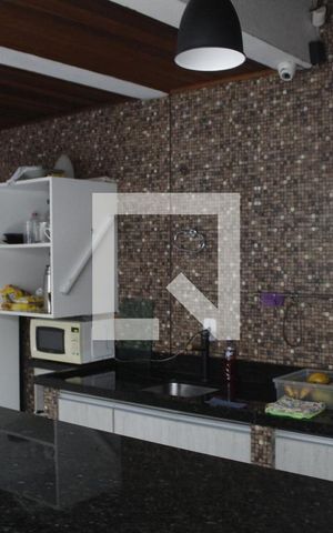 Casa de condomínio para alugar com 160m², 3 quartos e 2 vagasCozinha