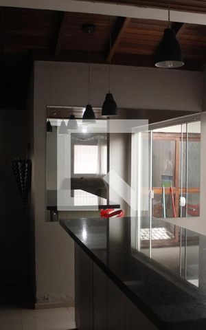 Casa de condomínio para alugar com 160m², 3 quartos e 2 vagasCozinha