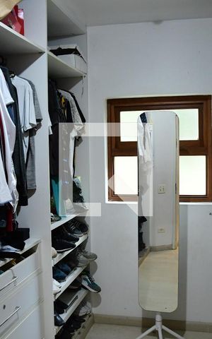 Casa de condomínio para alugar com 900m², 7 quartos e 6 vagasCloset da suíte 1