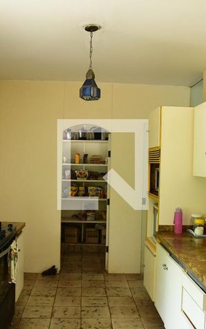 Casa de condomínio para alugar com 900m², 7 quartos e 6 vagasCozinha