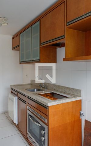 Apartamento à venda com 63m², 2 quartos e 1 vaga Apartamento à venda com 63m², 2 quartos e 1 vagaCozinha e Área de Serviço