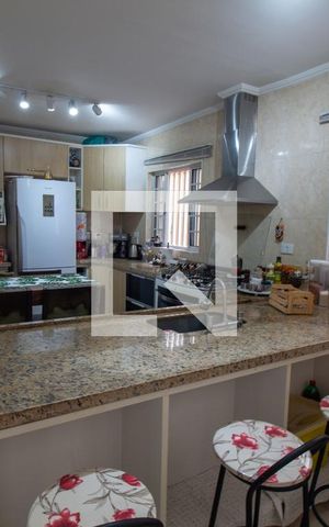 Casa à venda com 135m², 3 quartos e 2 vagas Casa à venda com 135m², 3 quartos e 2 vagasCozinha