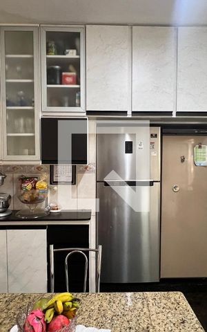 Casa à venda com 150m², 3 quartos e 2 vagas Casa à venda com 150m², 3 quartos e 2 vagasCozinha