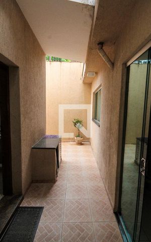 Casa à venda com 294m², 3 quartos e 3 vagas Casa à venda com 294m², 3 quartos e 3 vagasCorredor externo