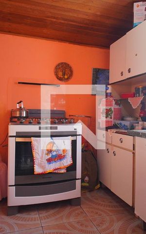 Casa à venda com 120m², 1 quarto e 2 vagas Casa à venda com 120m², 1 quarto e 2 vagasCozinha