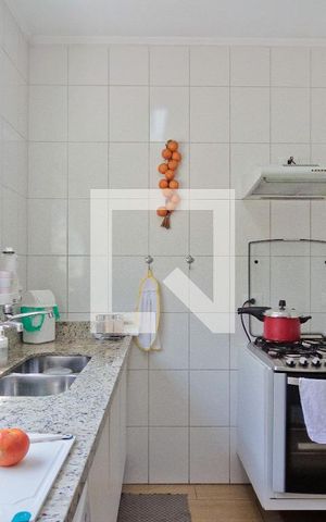 Casa à venda com 131m², 2 quartos e 2 vagas Casa à venda com 131m², 2 quartos e 2 vagasCozinha
