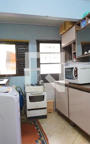 Casa à venda com 290m², 4 quartos e 2 vagasCozinha 