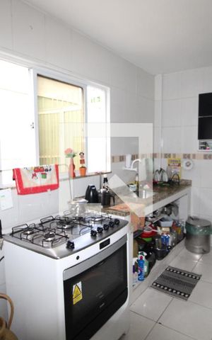 Casa de condomínio à venda com 80m², 2 quartos e 2 vagasCozinha