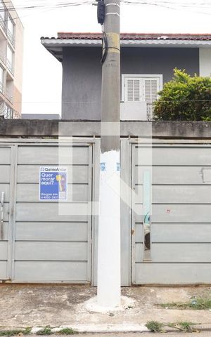 Casa à venda com 100m², 2 quartos e 2 vagasFachada - Placa instalada no portão do imóvel