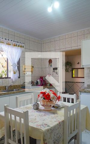 Casa à venda com 125m², 2 quartos e 2 vagas Casa à venda com 125m², 2 quartos e 2 vagasCozinha