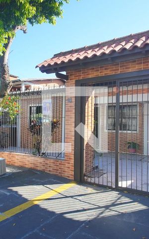 Casa à venda com 125m², 2 quartos e 2 vagas Casa à venda com 125m², 2 quartos e 2 vagasFachada