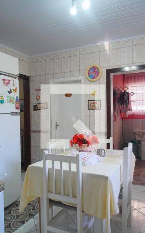 Casa à venda com 125m², 2 quartos e 2 vagas Casa à venda com 125m², 2 quartos e 2 vagasCozinha
