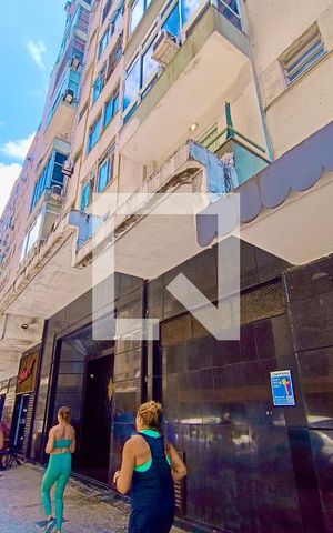 Apartamento à venda com 132m², 3 quartos e sem vagaFachada com cartaz QA.