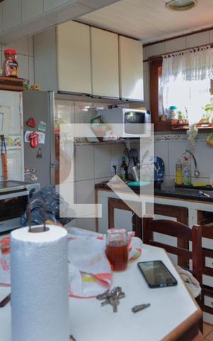 Casa de condomínio à venda com 80m², 2 quartos e 1 vaga Casa de condomínio à venda com 80m², 2 quartos e 1 vagaCozinha