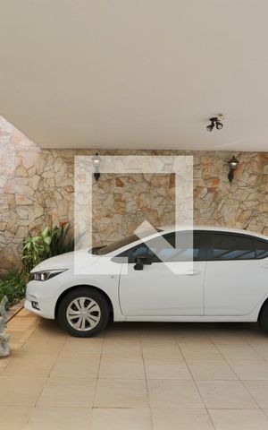 Casa à venda com 450m², 4 quartos e 7 vagas Casa à venda com 450m², 4 quartos e 7 vagasGaragem