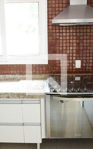 Casa de condomínio para alugar com 582m², 4 quartos e 4 vagasCozinha
