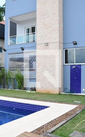 Casa de condomínio para alugar com 582m², 4 quartos e 4 vagasFundos