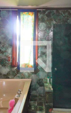 Casa à venda com 375m², 4 quartos e 2 vagasBanheiro da Suíte