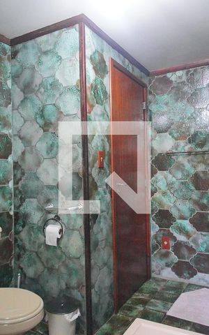 Casa à venda com 375m², 4 quartos e 2 vagasBanheiro da Suíte
