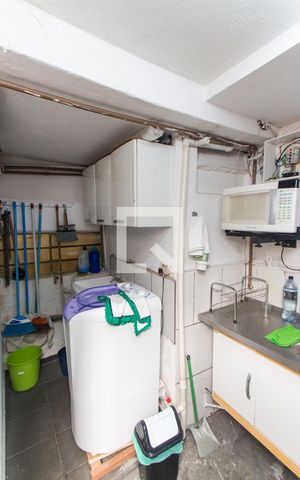 Casa à venda com 160m², 5 quartos e 2 vagasCasa 2 - Cozinha e Área de Serviço  
