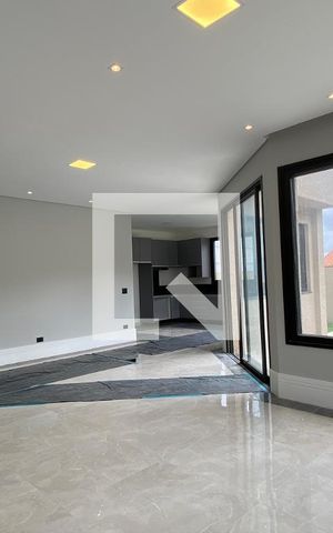 Casa de condomínio à venda com 200m², 4 quartos e 4 vagasSala