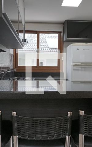 Casa de condomínio à venda com 169m², 3 quartos e 3 vagasCozinha 