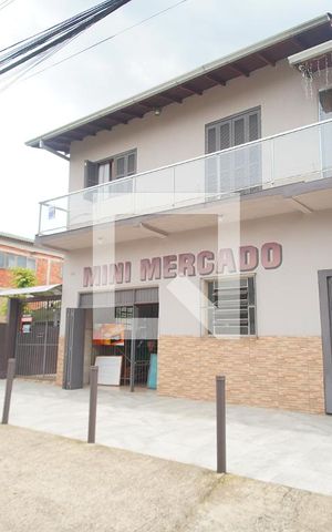Casa à venda com 300m², 2 quartos e 2 vagas Casa à venda com 300m², 2 quartos e 2 vagasFachada