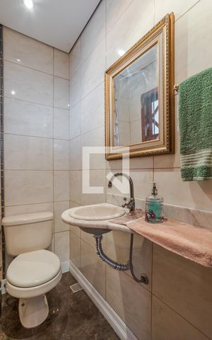 Casa de condomínio à venda com 170m², 3 quartos e 1 vaga Casa de condomínio à venda com 170m², 3 quartos e 1 vagaLavabo 1