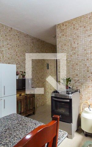 Casa à venda com 130m², 4 quartos e 2 vagas Casa à venda com 130m², 4 quartos e 2 vagasCozinha