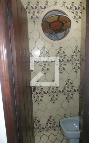 Casa para alugar com 410m², 5 quartos e 7 vagasBanheiro Social 
