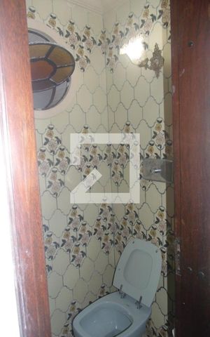 Casa para alugar com 410m², 5 quartos e 7 vagasBanheiro Social 