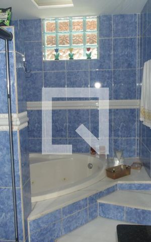 Casa para alugar com 410m², 5 quartos e 7 vagasBanheiro da Suíte 1