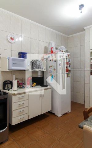 Casa à venda com 231m², 3 quartos e 2 vagas Casa à venda com 231m², 3 quartos e 2 vagasCozinha