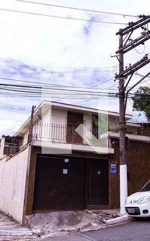 Casa à venda com 207m², 4 quartos e 5 vagas Casa à venda com 207m², 4 quartos e 5 vagasFachada