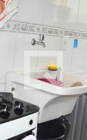 Apartamento para alugar com 50m², 2 quartos e 1 vagaCozinha com área de serviços e banheiro