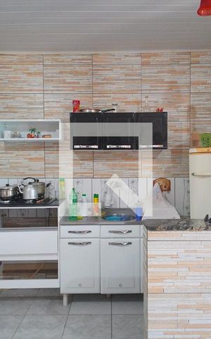 Casa à venda com 64m², 2 quartos e 4 vagas Casa à venda com 64m², 2 quartos e 4 vagasCozinha
