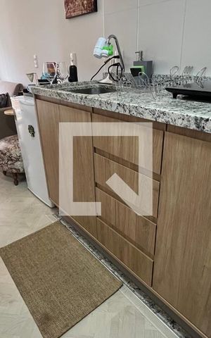 Studio à venda com 28m², 1 quarto e sem vaga Studio à venda com 28m², 1 quarto e sem vagaCozinha - Armários