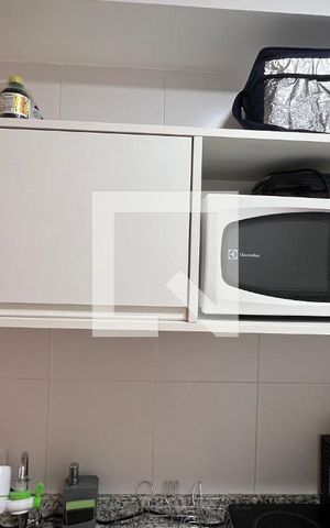Studio à venda com 28m², 1 quarto e sem vaga Studio à venda com 28m², 1 quarto e sem vagaCozinha - Armários