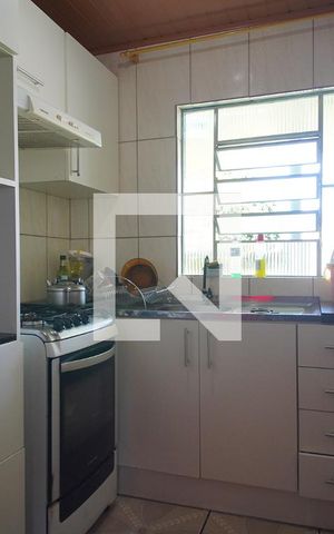 Casa à venda com 85m², 3 quartos e 2 vagas Casa à venda com 85m², 3 quartos e 2 vagasCozinha