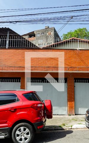 Casa à venda com 330m², 4 quartos e 3 vagas Casa à venda com 330m², 4 quartos e 3 vagasFachada