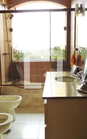 Casa à venda com 344m², 4 quartos e 4 vagasBanheiro