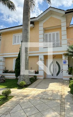 Casa de condomínio à venda com 600m², 4 quartos e 6 vagasFachada
