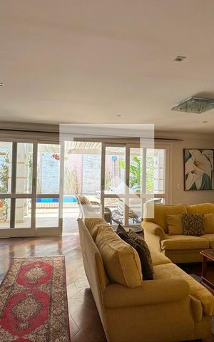 Casa de condomínio à venda com 600m², 4 quartos e 6 vagasSala