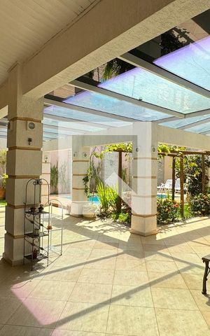 Casa de condomínio à venda com 600m², 4 quartos e 6 vagasChurrasqueira